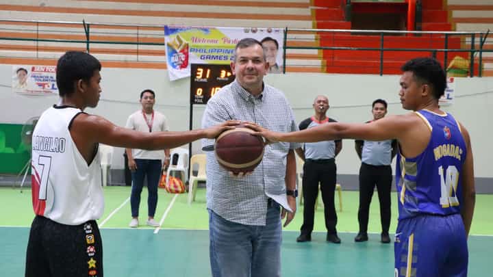 PSC chairman Richard ‘Dickie’ Bachmann makes the ceremonial toss in the basketball competition of the Philippine ROTC Games Mindanao leg.