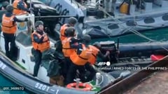 Chinese sailors wield knives, axe in disputed sea clash with Philippines
