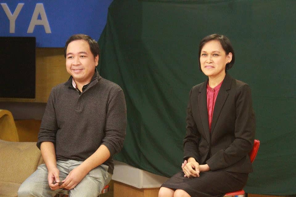 Filipino Sign Language interpreters John Baliza and Ma. Tess Buenaventura for their studio interpreting task pre-pandemic.