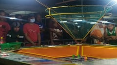 Extortion threatens barrio fiesta operators hosting dropball games