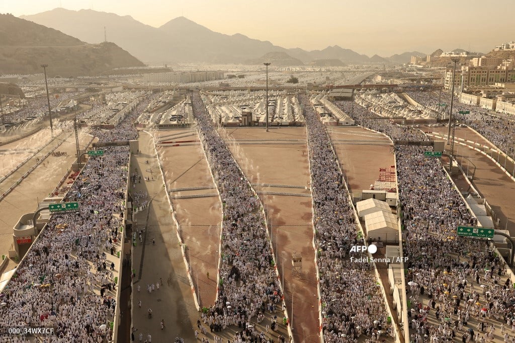 Muslim pilgrims arrive to perform the symbolic 'stoning of the devil' ritual as part of the hajj pilgrimage in Mina, near Saudi Arabia's holy city of Mecca, on June 16, 2024. Pilgrims perform the last major ritual of the hajj, the "stoning of the devil", in western Saudi Arabia on June 16, as Muslims the world over celebrate the Eid al-Adha holiday.