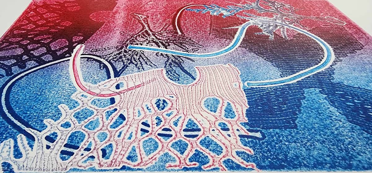 MALINIS practices the fine art of printmaking and the possibilities of creating experiences by mounting her prints into three-dimensional forms.