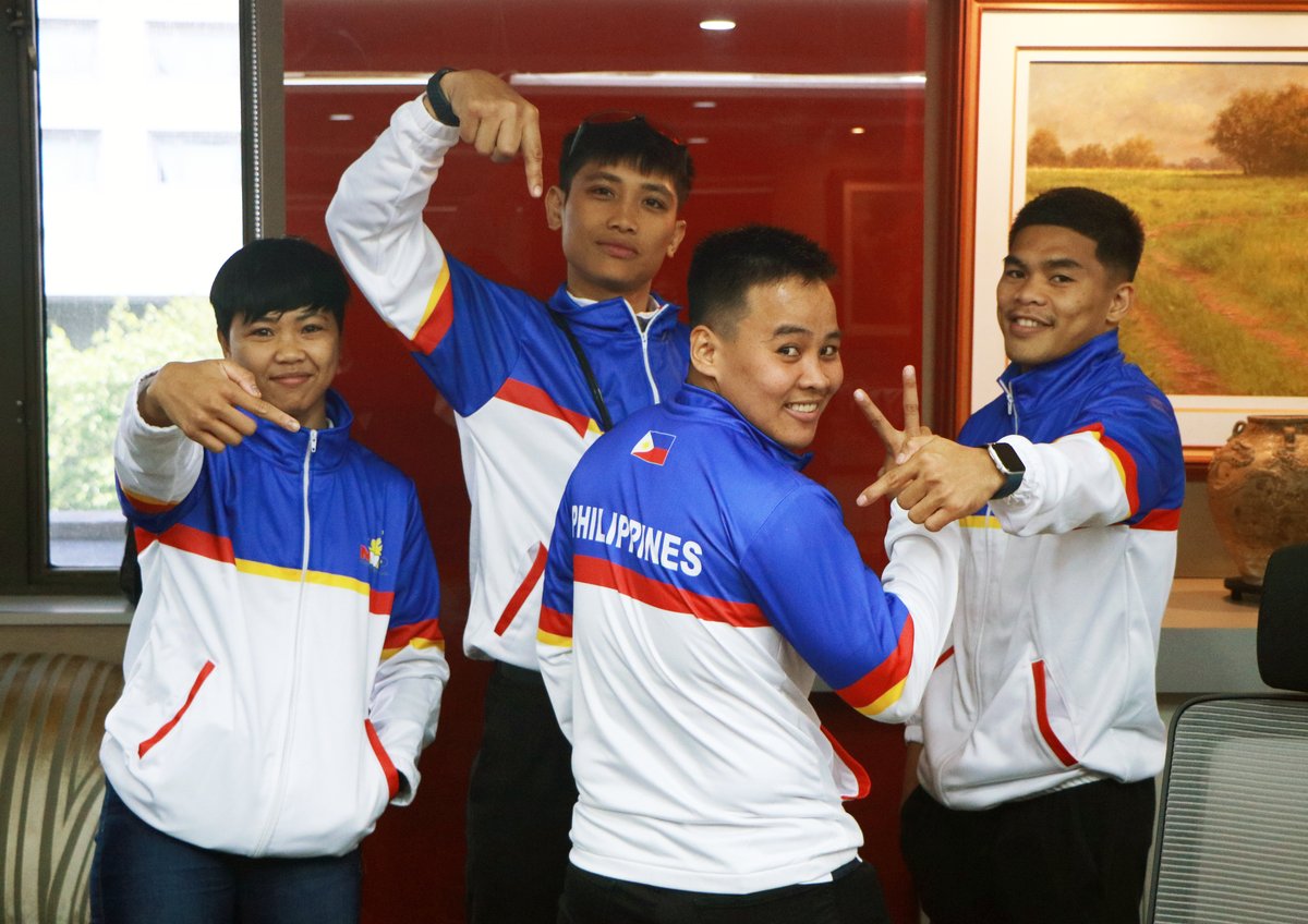 The National Boxing Team share a light moment with their MVPSF jackets during the meet and greet.