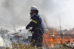 Greece fights dozens of wildfires