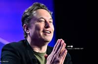 Tesla CEO Elon Musk speaks at the 27th annual Milken Institute Global Conference at the Beverly Hilton in Los Angeles on May 6, 2024. Tesla and SpaceX tycoon Elon Musk lashed out June 10, 2024 at a partnership between OpenAI and Apple, saying the threat to data security will make him ban iPhones at his companies.