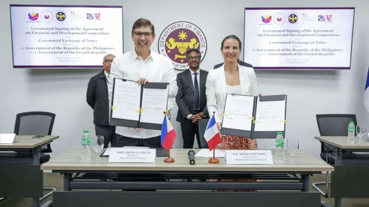 Finance Secretary Ralph Recto (left) and French Ambassador Extraordinary and Plenipotentiary to the Philippines Marie Fontanel sign the Agreement on Financial and Development Cooperation.
