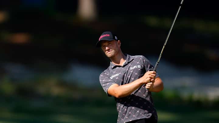 PINEHURST, NORTH CAROLINA - JUNE 12: Wyndham Clark of the United States plays an approach shot on the fourth hole during a practice round prior to the U.S. Open at Pinehurst Resort on June 12, 2024 in Pinehurst, North Carolina.