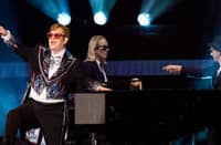 Sir Elton John onstage during the "Farewell Yellow Brick Road" tour at Dodger Stadium on 17 November 2022 in Los Angeles, California. (Photo by SCOTT DUDELSON / Getty Images North America / AFP)