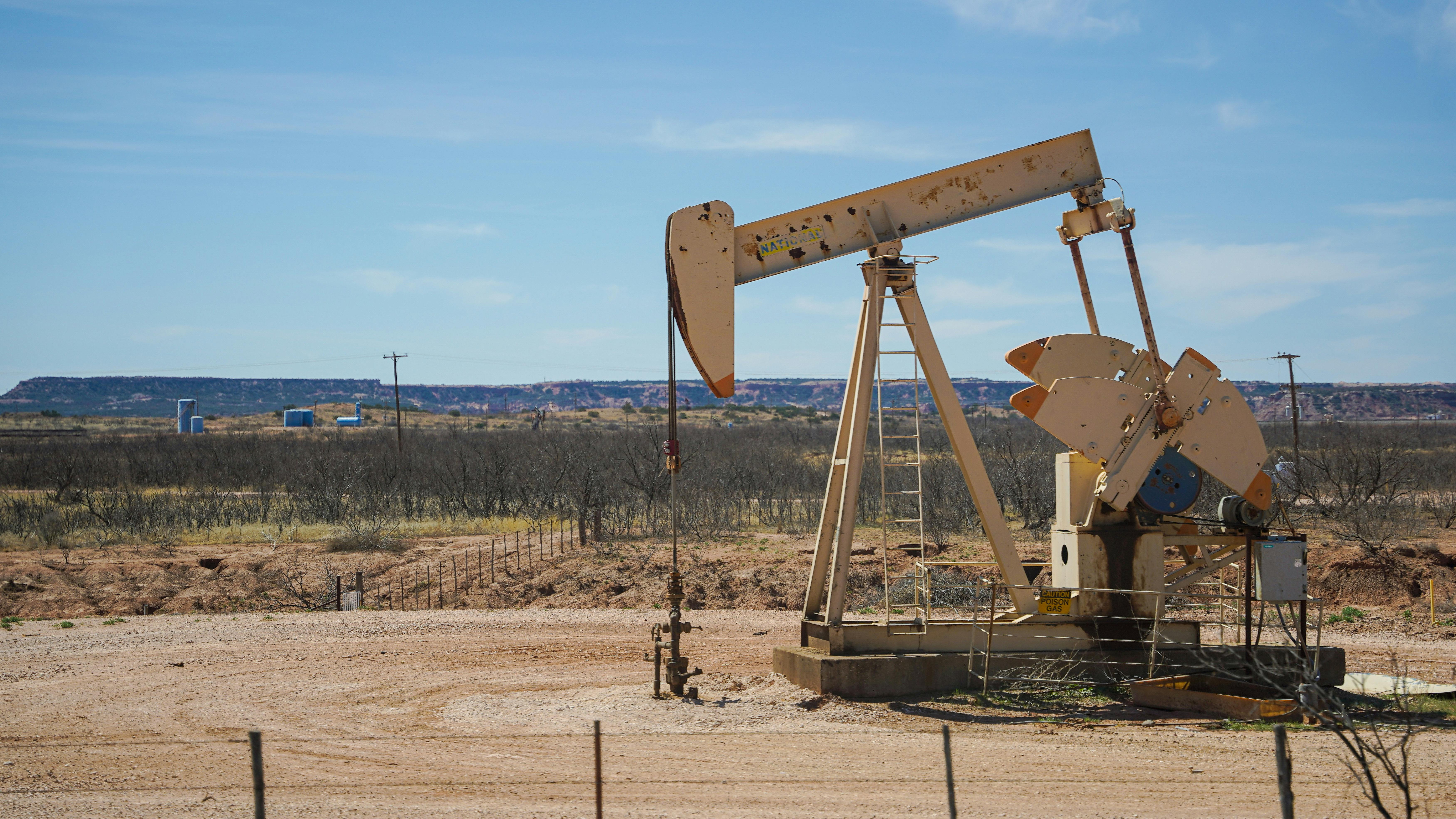 Stock markets edge higher, oil climbs
