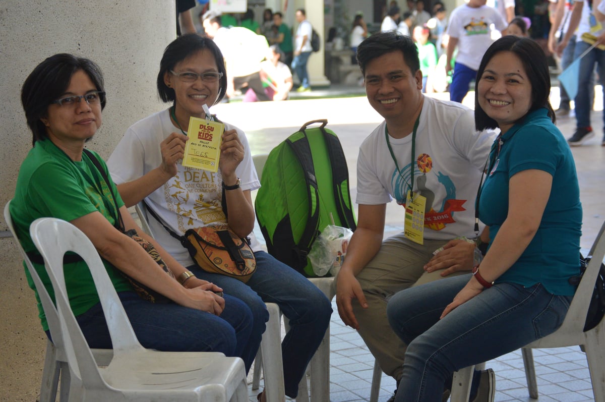 Ma. Teresa Buenaventura with De La Salle-College of Saint Benilde School of Deaf Education and Applied Studies faculty members Noemi Lacambacal, William Sidayon and Agnes Canayon at the For The Kids event.