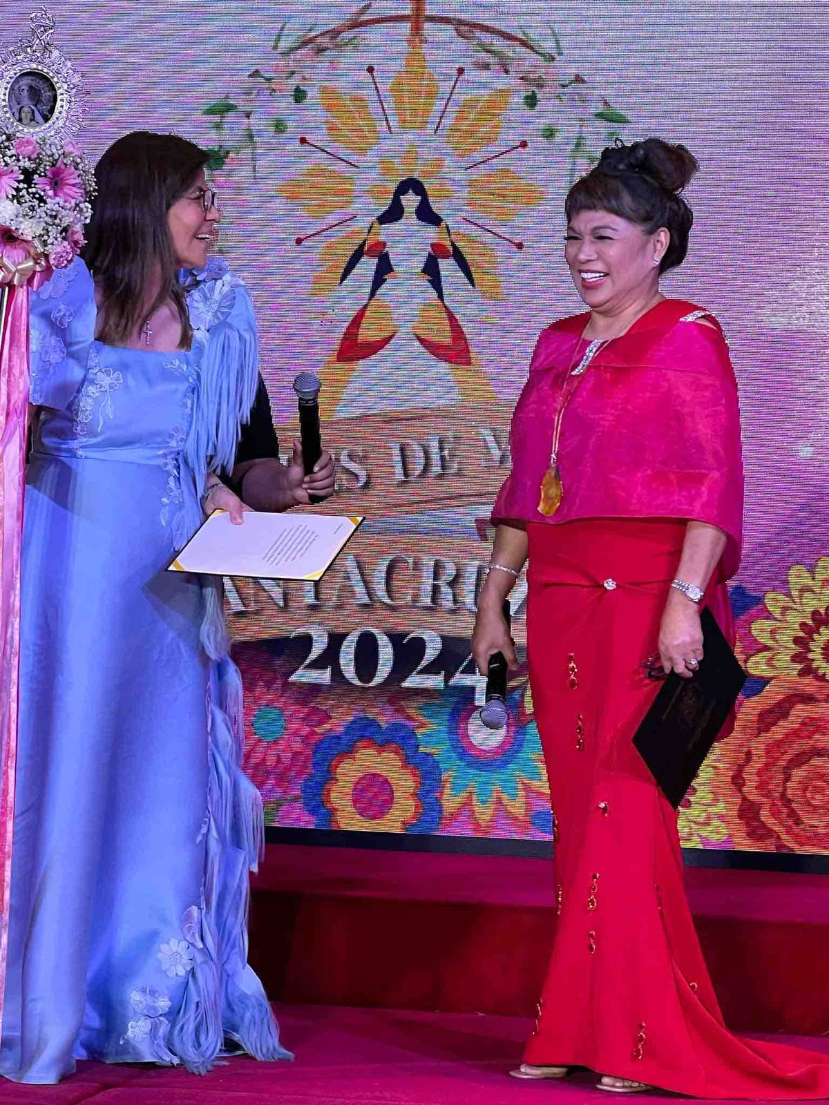 Turnover ceremony from 2024 Hermana Mayor Isabelita Mercedes Mercado to 2025 Hermana Mayor Margie Organo Tajon