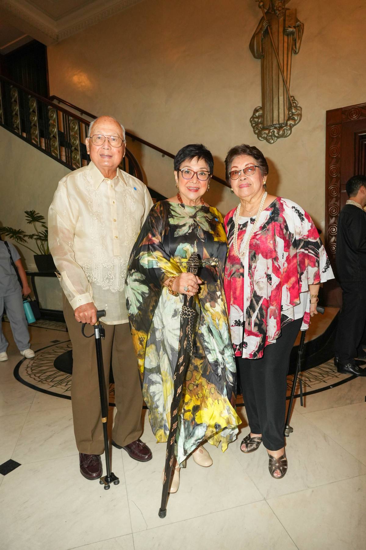 Mr. and Mrs. Leo de Guzman and Marilou Alejandro, director of Philippine Italian Association.