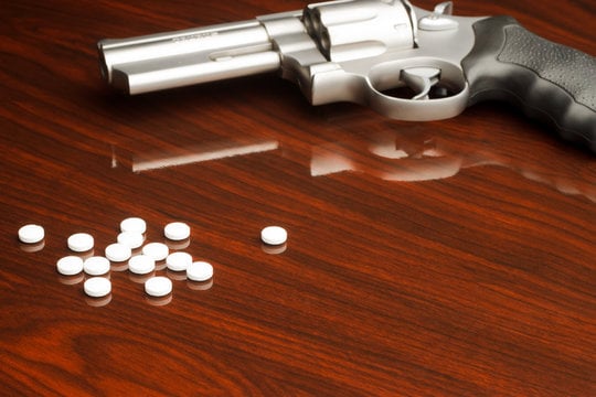 Lovers yield drugs, revolver
