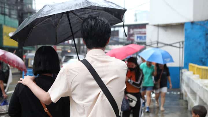 (FILE PHOTO) Walking in the rain
