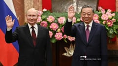 Putin in Hanoi after inking North Korea defense pact