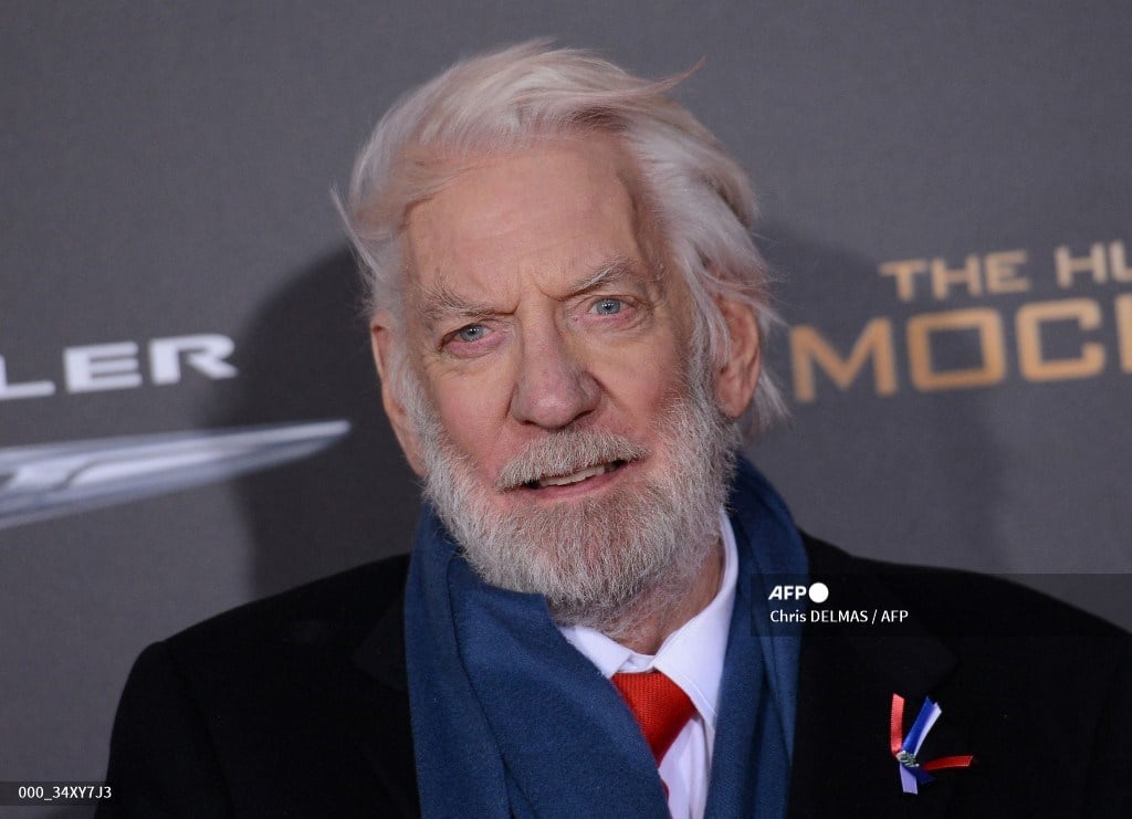 Canadian actor Donald Sutherland attends the premiere of 'The Hunger Games: Mockingjay - Part 2' at the Microsoft theatre in Los Angeles on November 16, 2015.