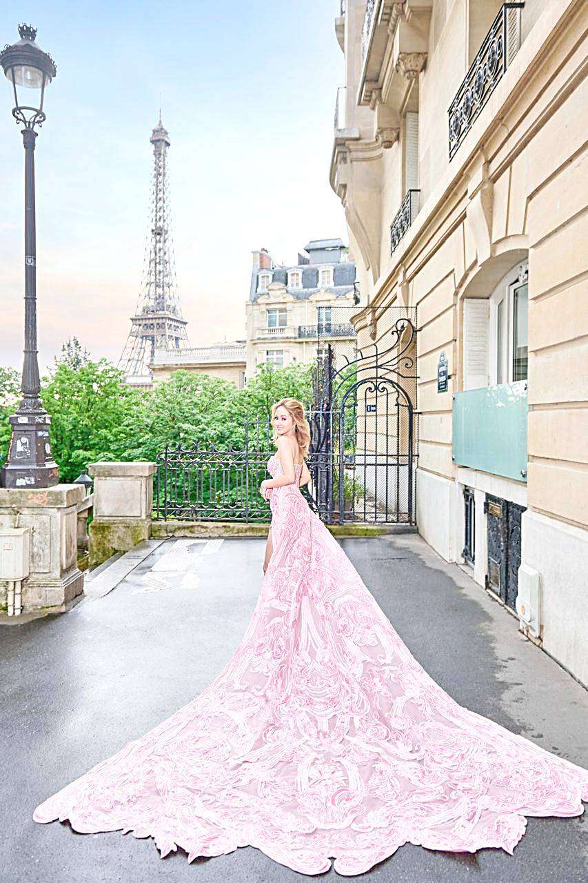 Happy Melendres looks magnificent in a Michael Cinco couture creation with the majestic Eiffel Tower in Paris as backdrop.