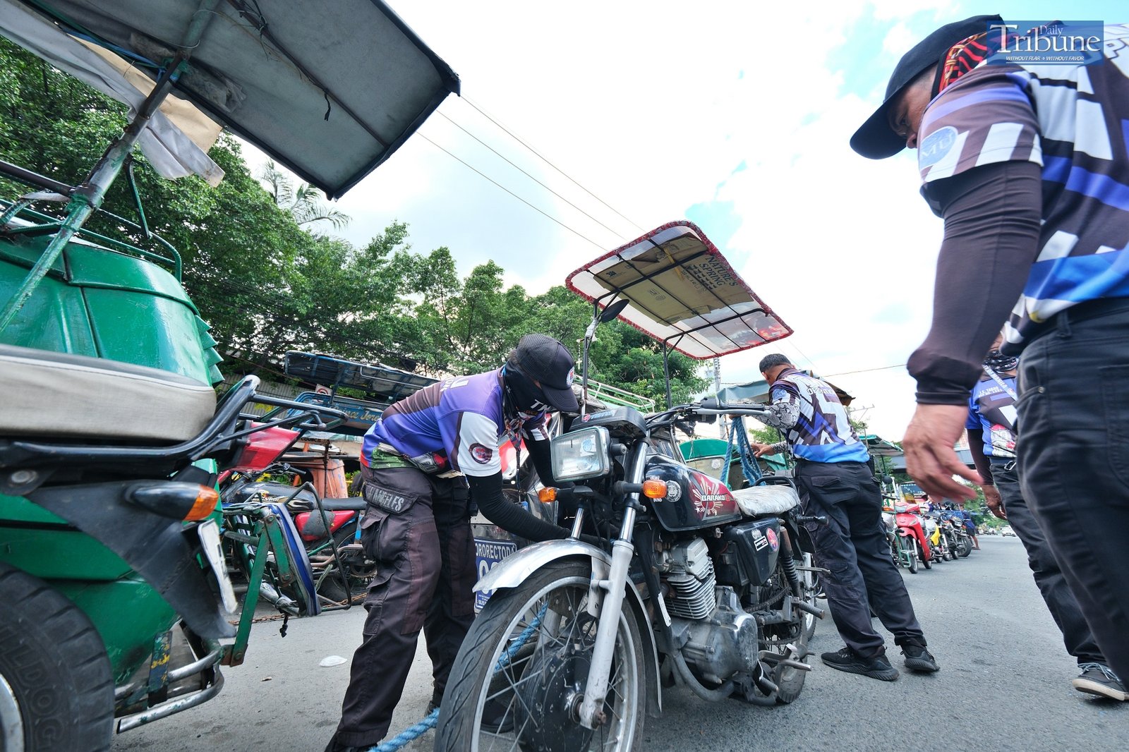 TRIBUNE-tricycles