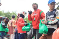 Volunteer drivers from Grab and MOVE IT