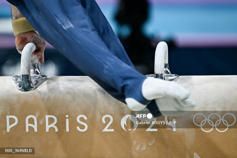 An athlete practices on the pommel horse at the Bercy Arena, on 24 July 2024 ahead of the start of the Paris 2024 Olympic Games in Paris.