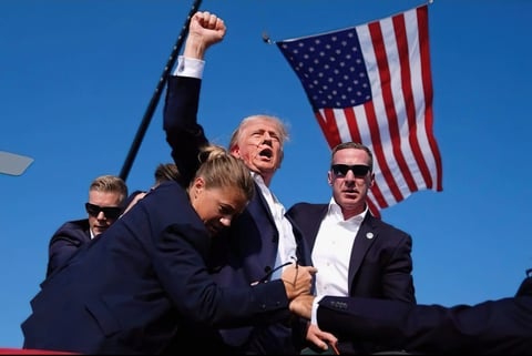 Trump safe after apparent assassination attempt, person in custody
