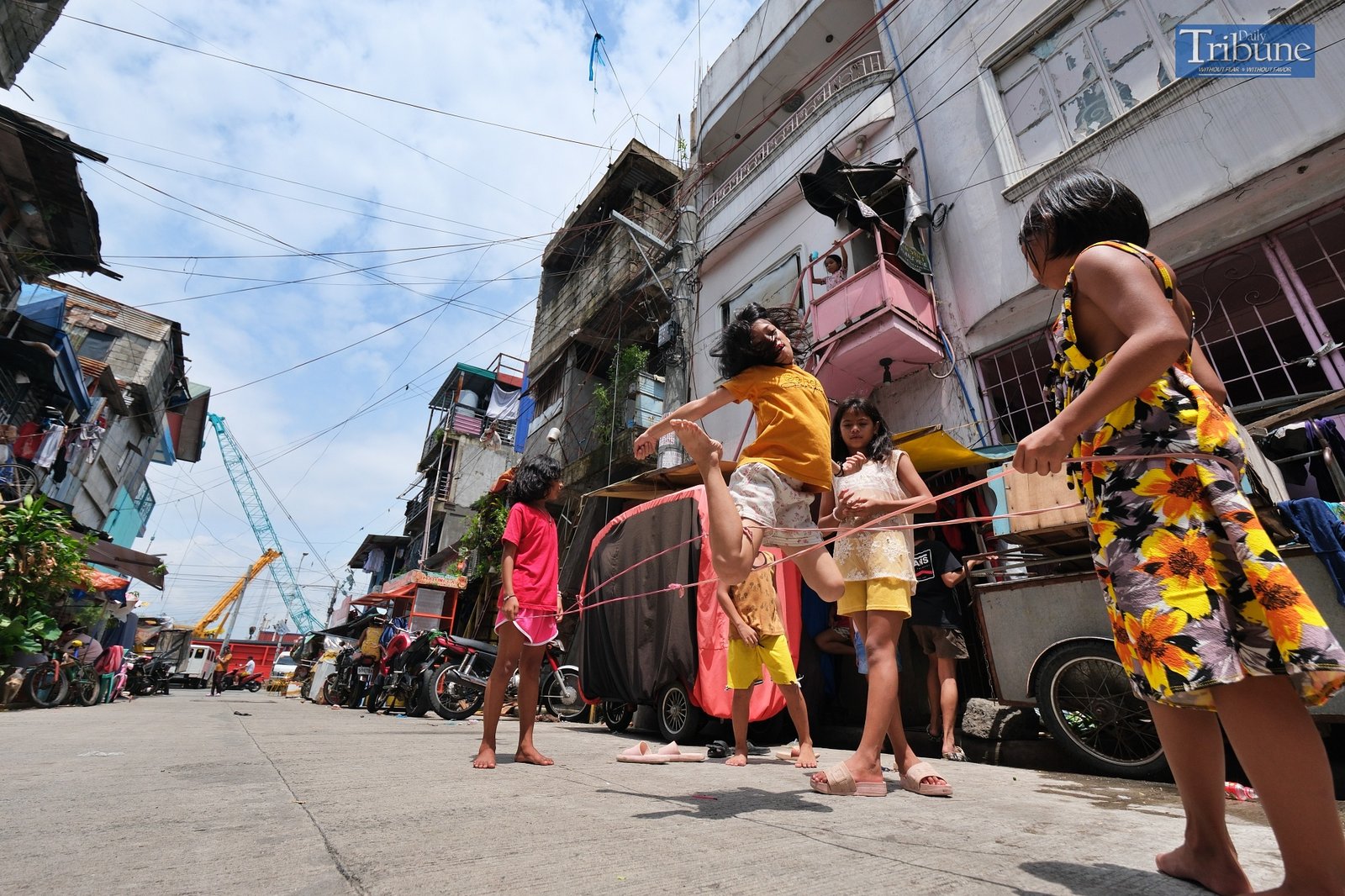 TRIBUNE-kids-playing-chinese-garter
