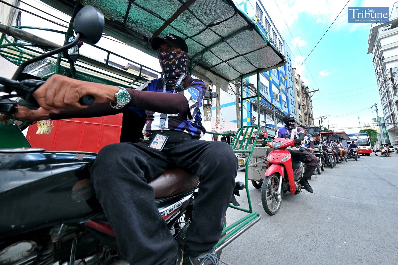 TRIBUNE-tricycles