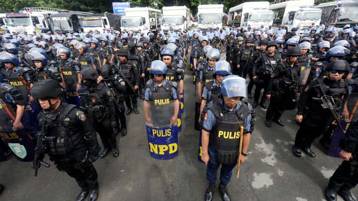 Police officers from the National Capital Region Police Office and the Quezon City Police District attend the send-off at Camp Karingal in Quezon City as part of the preparations for the third State of the Nation Address of President Ferdinand Marcos Jr. on Monday. The NCRPO has augmented at least 2,000 cops for the security of the event.