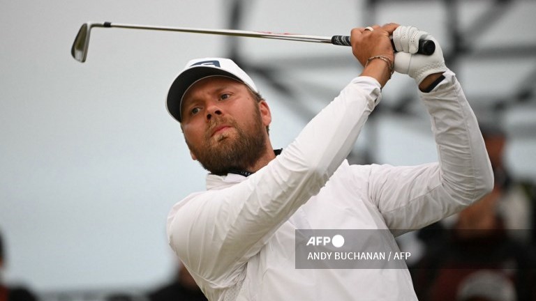 Brown takes shock British Open lead as McIlroy, Woods suffer nightmare starts
