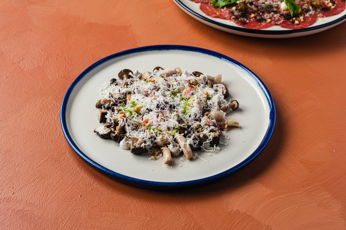wild Mushrooms Confit and Gruyere Cheese.