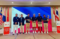 MEMBERS of the national team celebrate after reclaiming the Putra Cup trophy at the Seletar Country Club in Singapore. Shown are (from right) national coach Boyet Zaragosa, Jet Hernandez, Enrique Dimayuga, Carl Corpus and NGAP secretary general Bones Floro with a tournament official from the Singapore Golf Association.