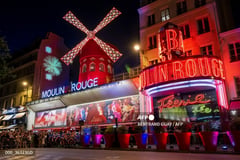 Iconic Moulin Rouge Windmill Spins Again: Paris Landmark Ready for Olympic Spotlight