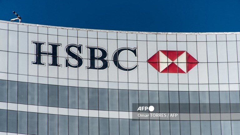 (FILES) A sign of HSBC (The Hongkong and Shanghai Banking Corporation) is seen on a building in Mexico City on 3 December 2018.