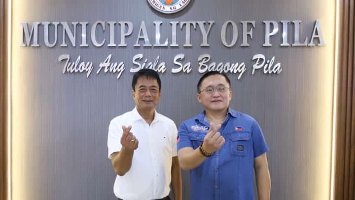 Pila, Laguna Mayor Edgardo Ramos (left) and Senator Christopher "Bong" Go