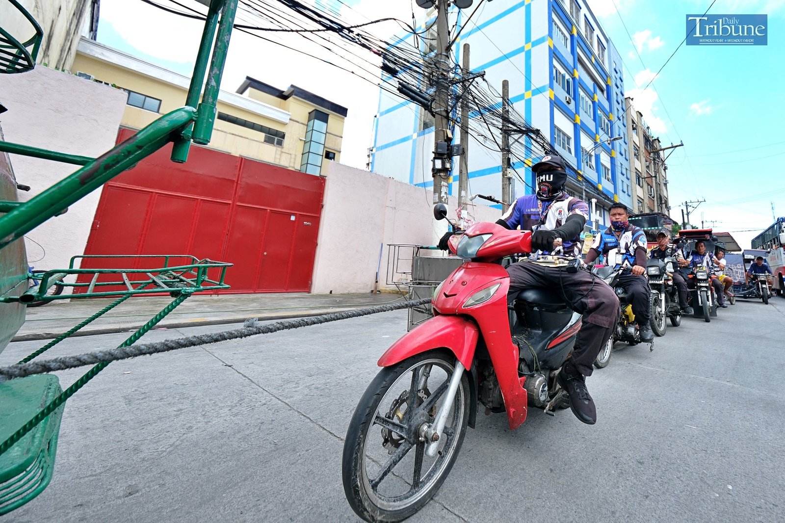 TRIBUNE-tricycles