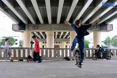 SKATEBOARDING UNDER THE BRIDGE