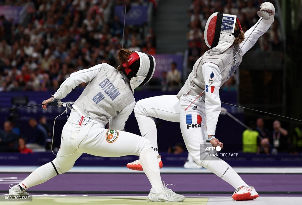 MAXINE Esteban of Ivory Coast challenges Pauline Ranvier of France during their women’s foil fencing event in the Paris Olympics.