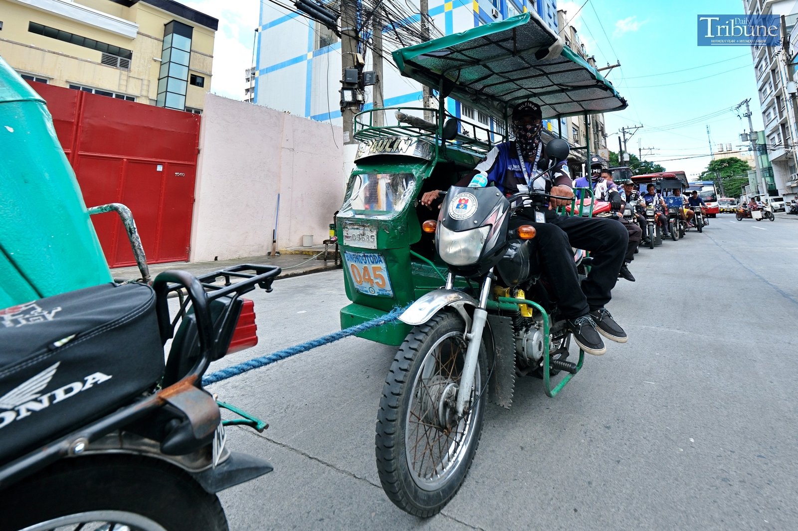 TRIBUNE-tricycles