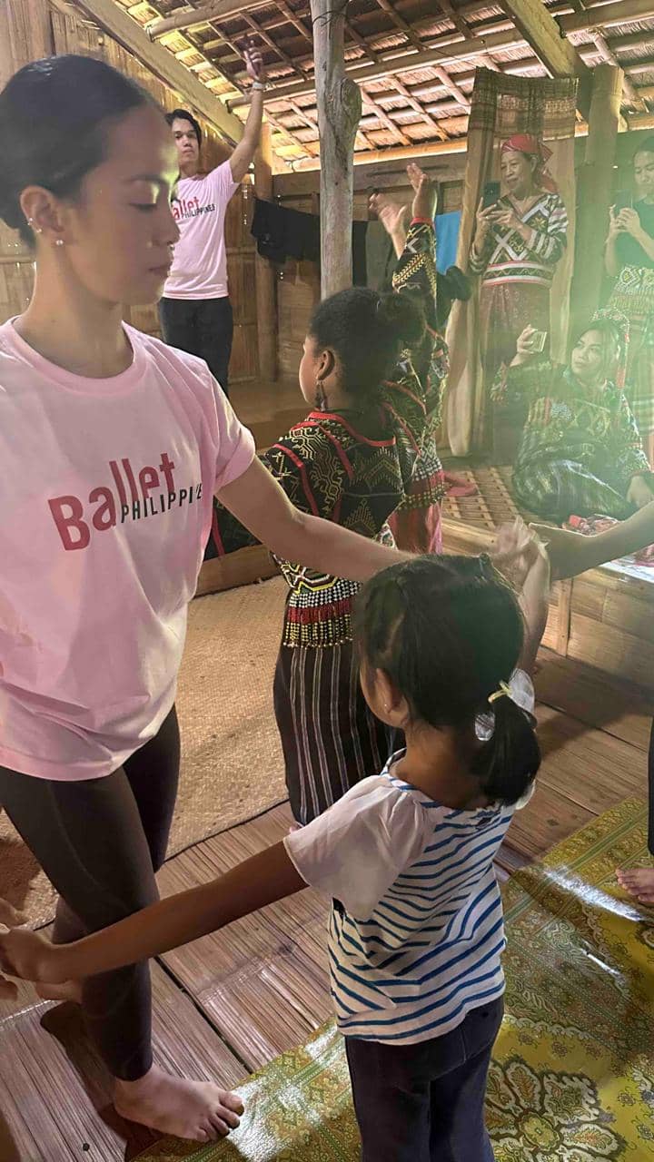 Clarissa, a core BP ballerina, is showing the kids the basic positions of ballet.