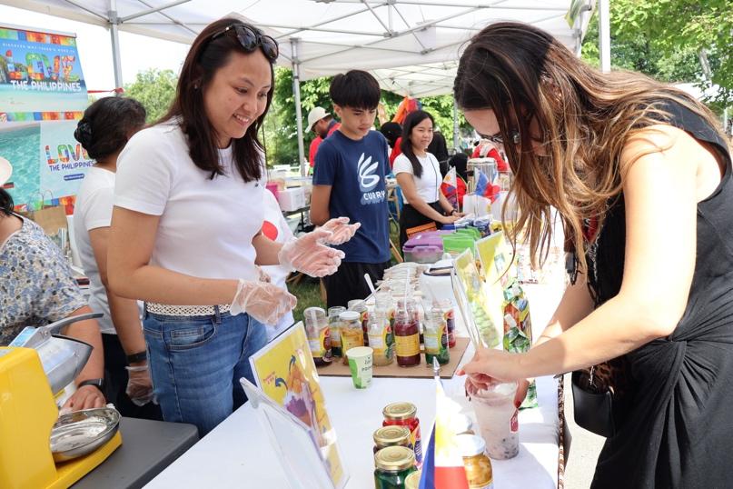 The halo-halo delights a Warsaw crowd at the breakfast market, a sweet, icy respite from the summer heat.