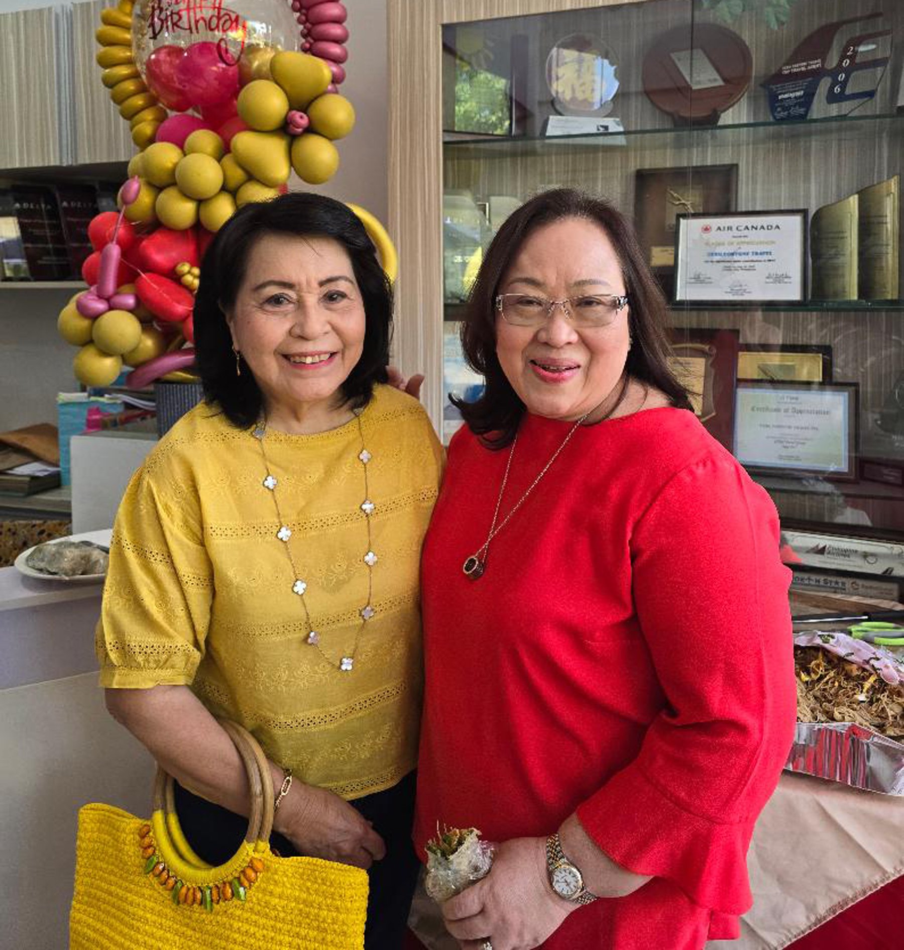 Nelia Neri and Baby Dy of Grand Hope Travel.