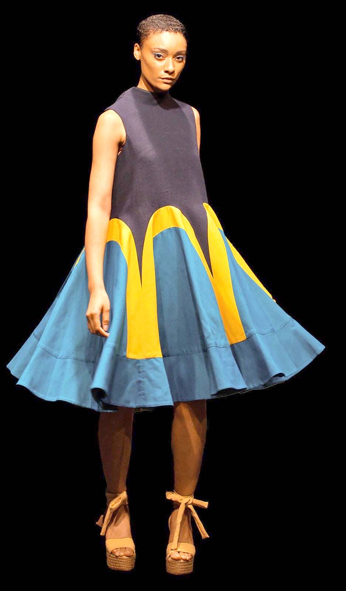 adding a pop of color with Bacudio’s bold hues flowy dress.