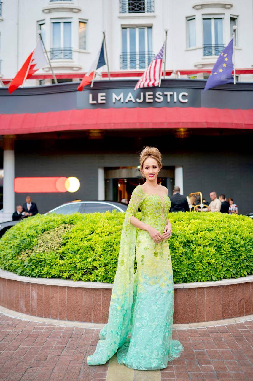 Cebu's power woman Happy Melendres is ravishing in a tricolor Michael Cinco couture frock in Cannes, France.