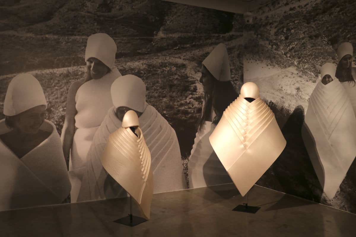 Body wrappings activated as wearable sculpture.