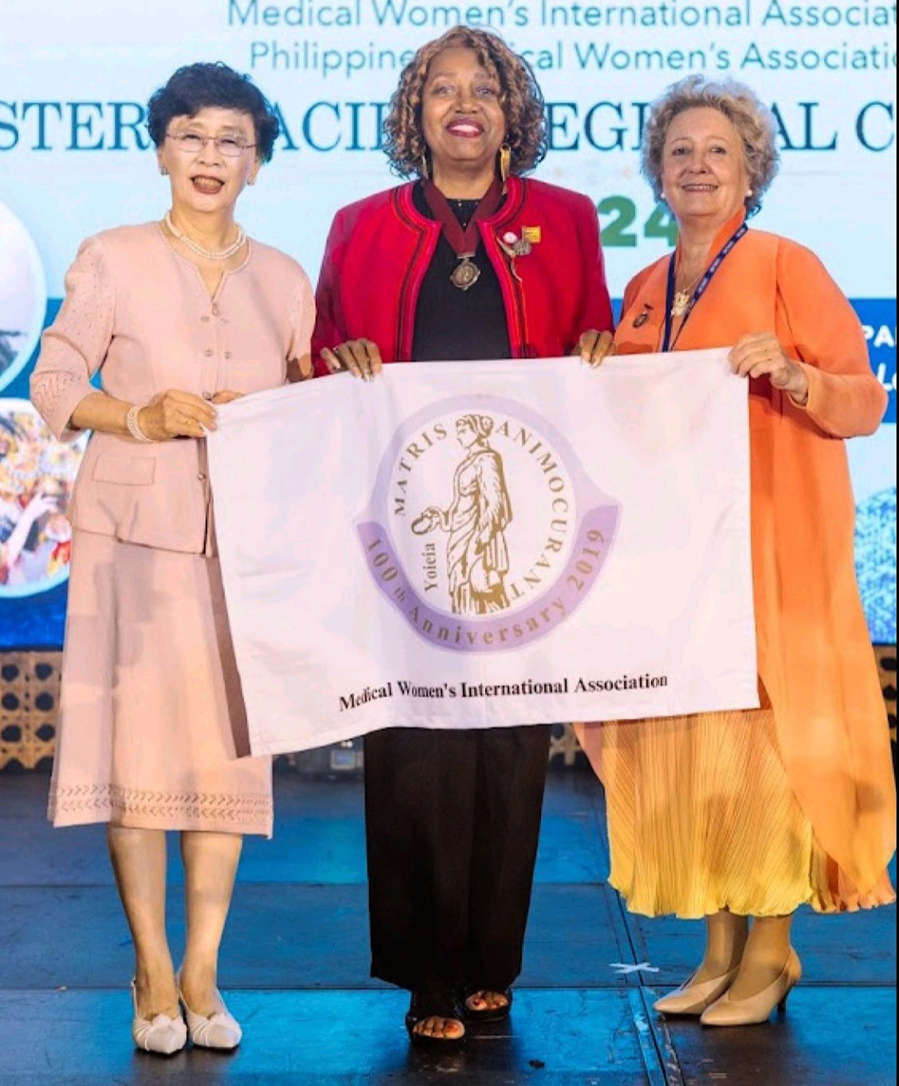 MWIA past president Kyung Ah Park, incumbent president Eleanor Anne Nwadinobi and past president Gabrielle Casper.