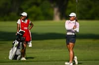 RIANNE Malixi in action with caddie Carmen Fletcher.