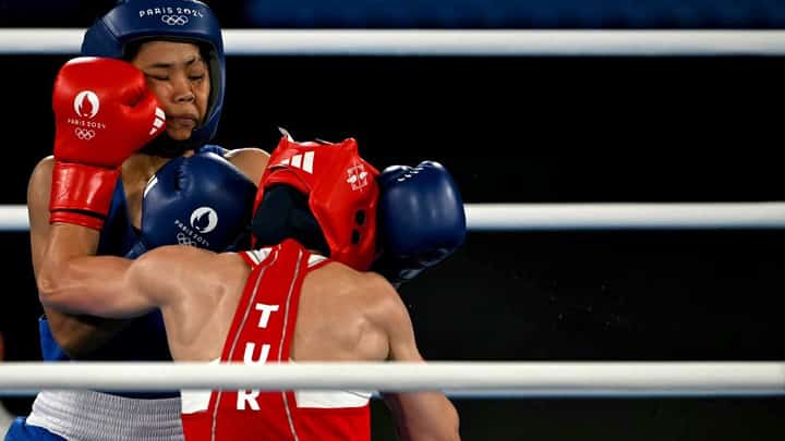 AIRA Villegas gets beaten by Buse Naz Cakiroglu of Turkey in the semifinals of the women’s 50-kilogram class of the Paris Olympics.