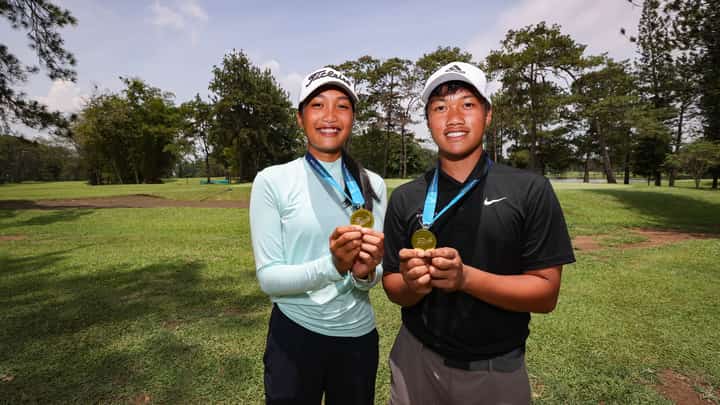 Zero Plete and Alexis Nailga display their medals after conquering the 13-15 age category of the ICTSI JPGT Mindanao Series 3 at Del Monte Golf Club in Bukidnon.