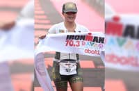 (FILE) LEYANN Ramo crosses the finish line after bagging the overall championship in the IRONMAN 70.3 Davao on Sunday at the Davao City Coastal Road.