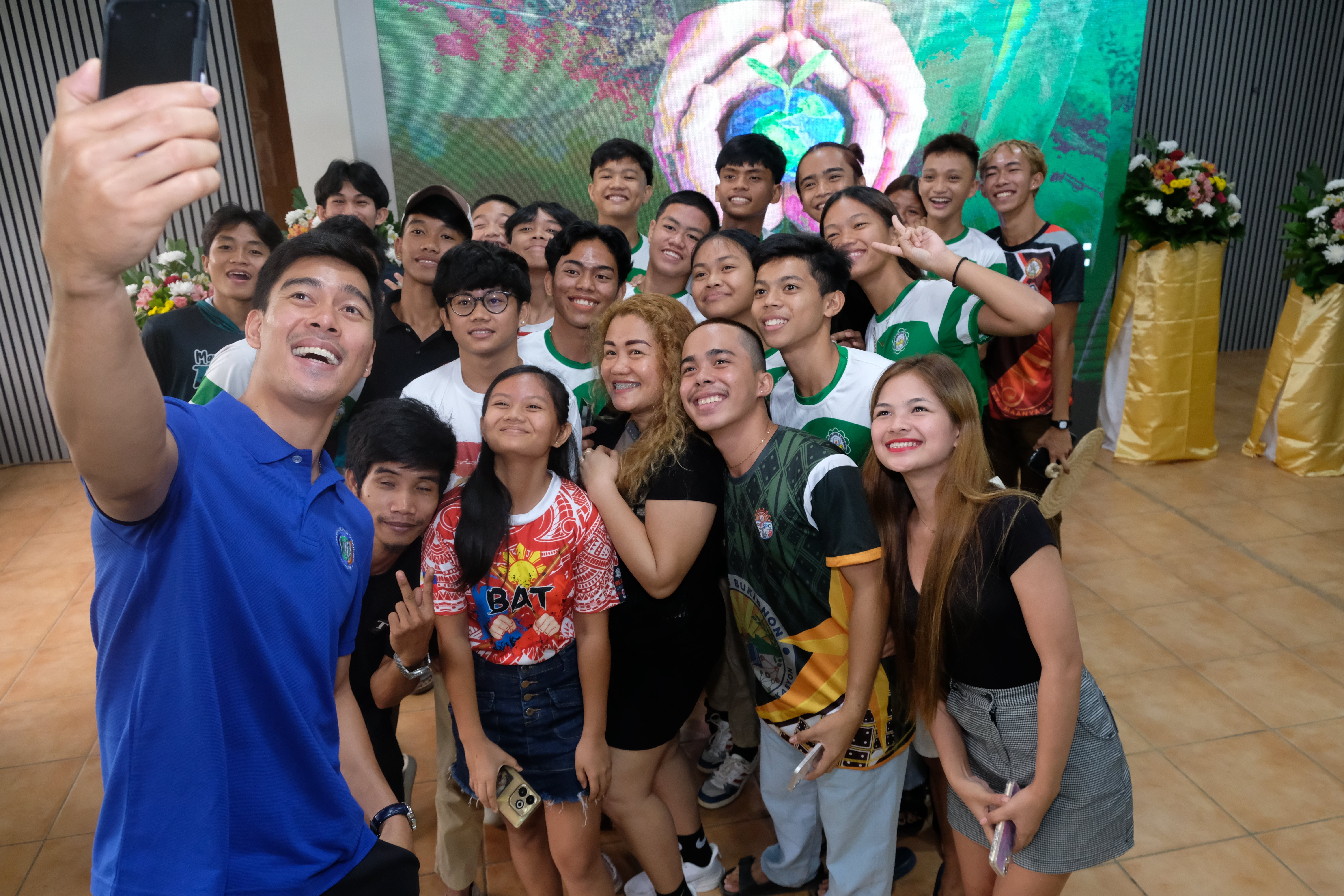 Bryan Bagunas (left) hopes to inspire a new generation of climate-conscious youth by using digital tools to spread the message.
